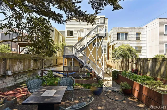 front view of a house with a small yard