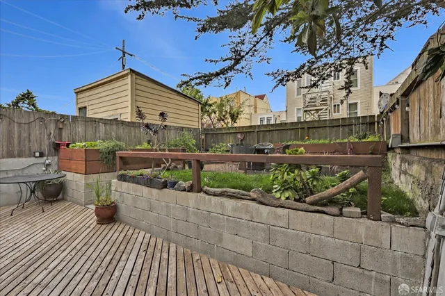 a view of balcony with wooden floor
