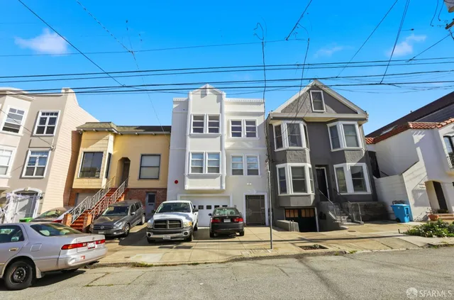 a car parked in front of a house