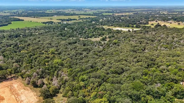 a view of a city with ocean view