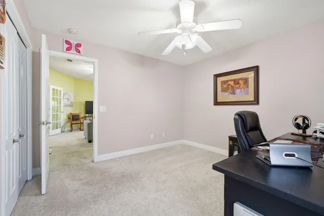 a bathroom with a granite countertop sink a bathtub and shower