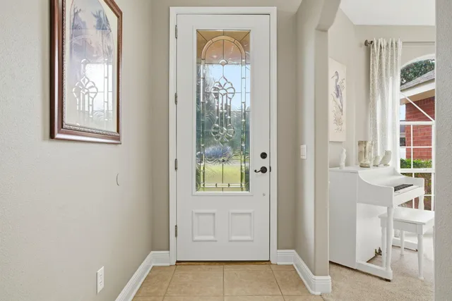 a bathroom with a sink a washer and dryer