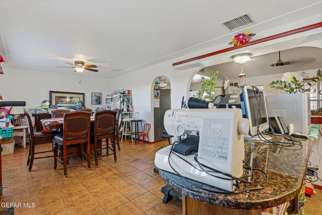 a bedroom with a bed and dresser