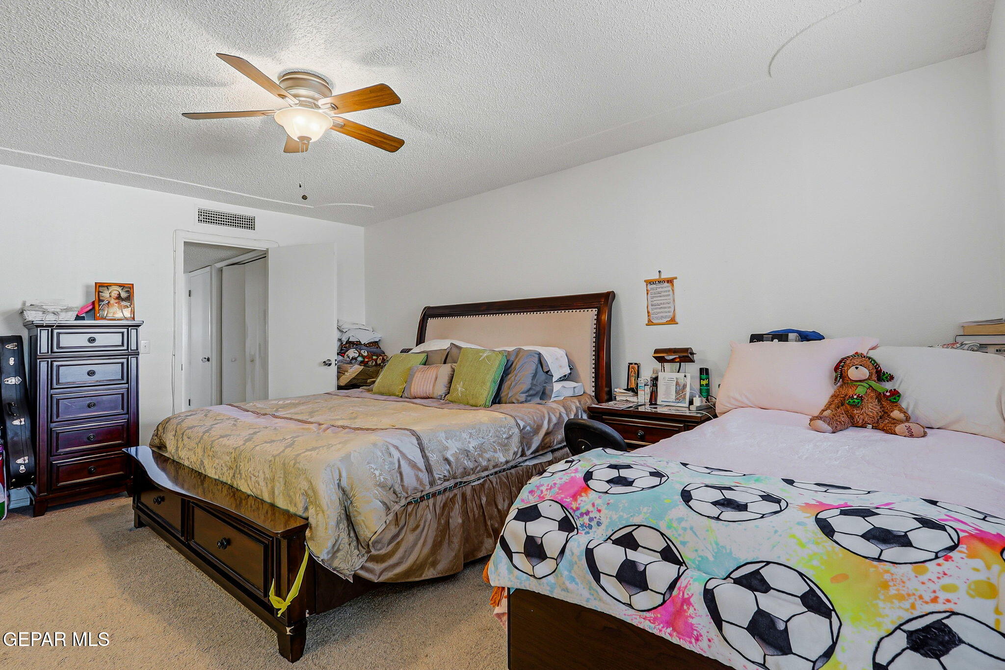 1602 Waterfront Street Anthony, NM 88021 - Photo 27 of 58 a bedroom with a bed and dresser