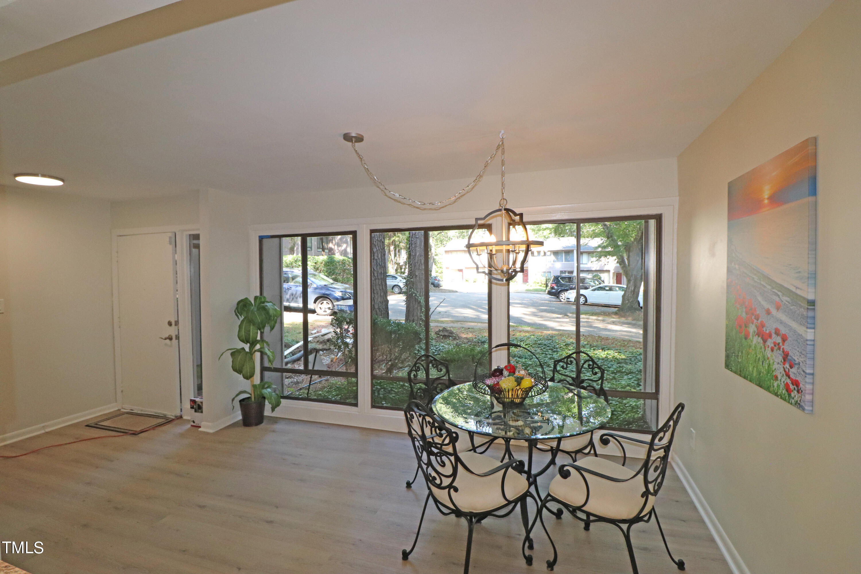 1716 Quail Ridge Road Raleigh, NC 27609 - Photo 14 of 39 a view of a dining room with furniture window and outside view