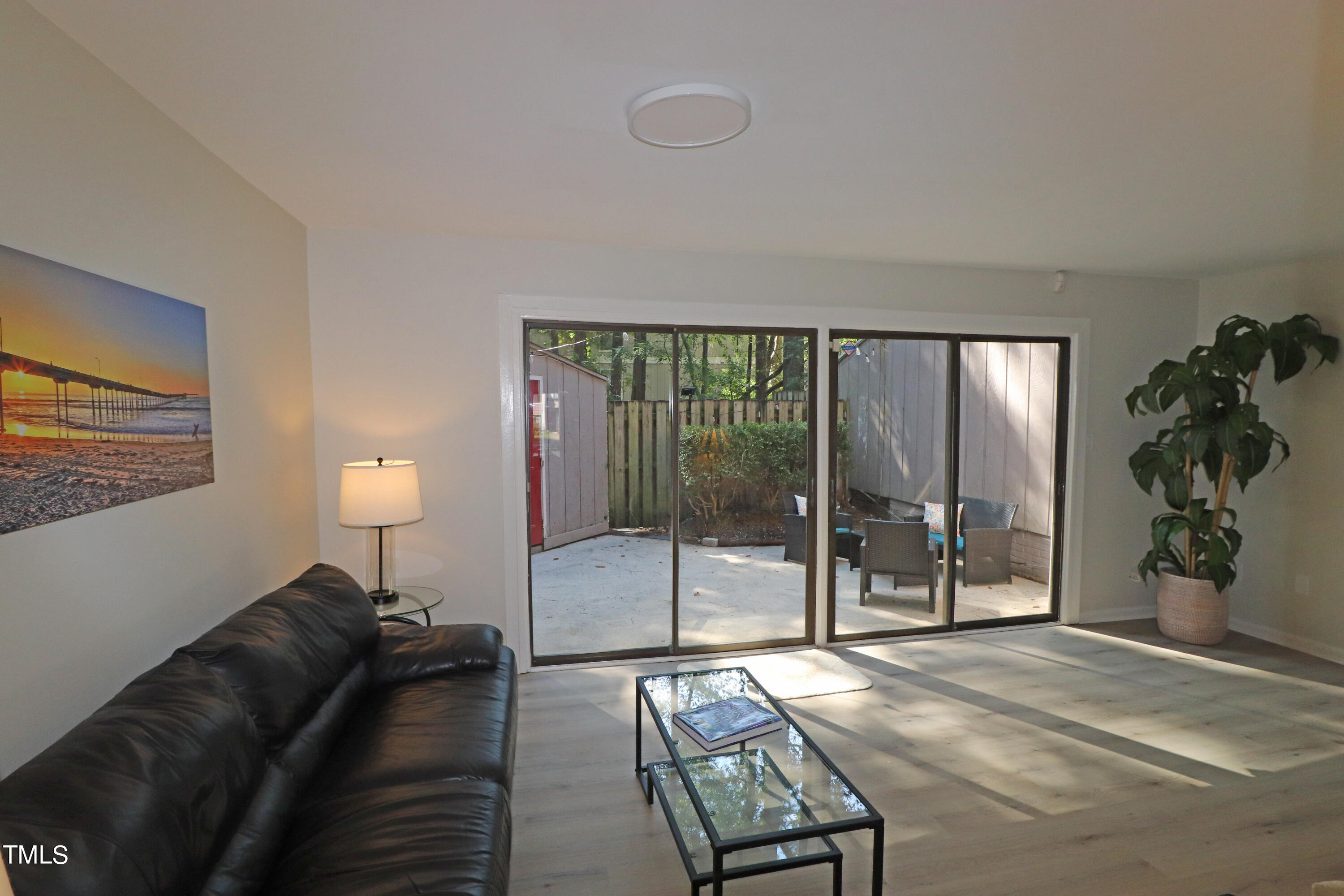 1716 Quail Ridge Road Raleigh, NC 27609 - Photo 4 of 39 a living room with furniture and a potted plant