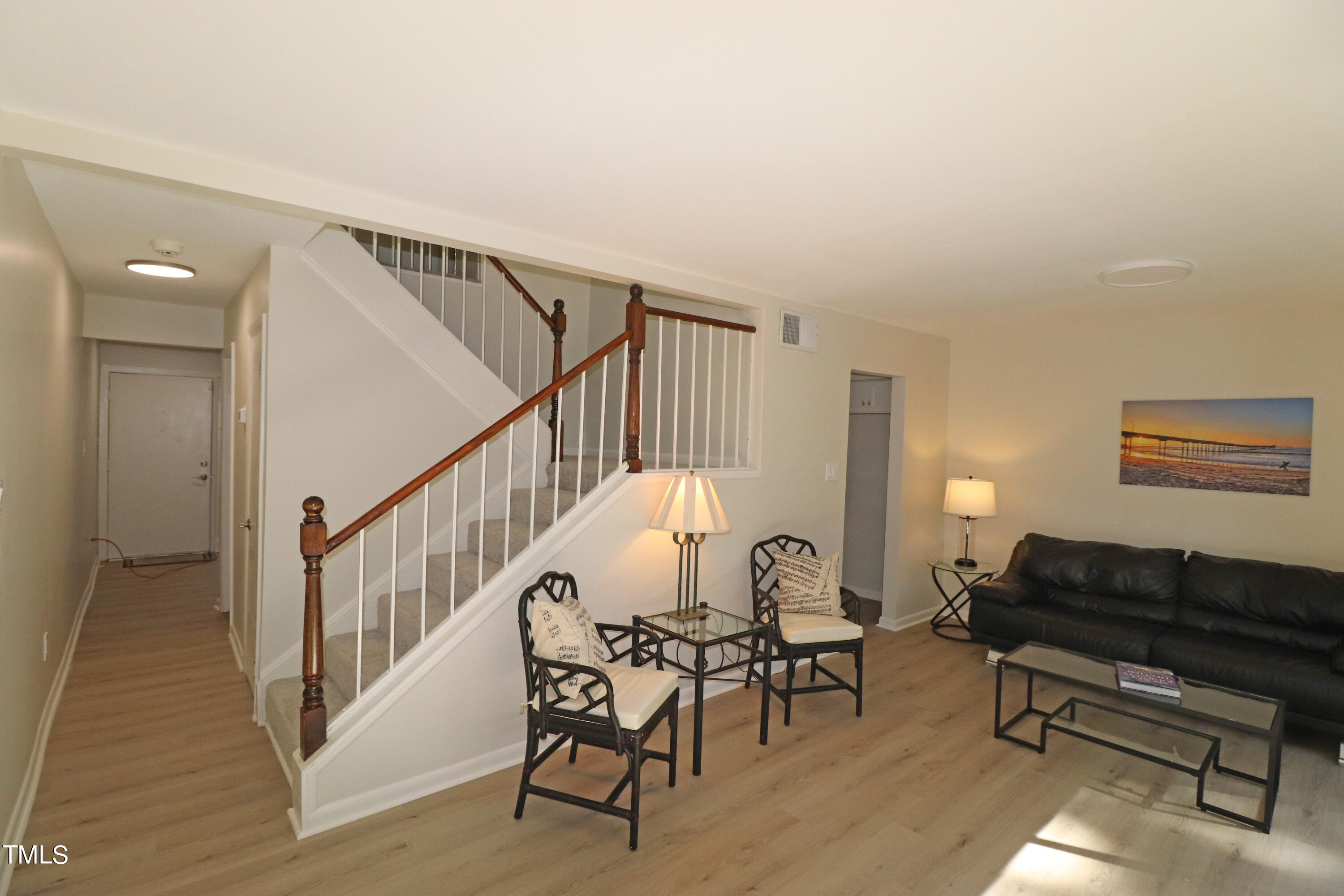 1716 Quail Ridge Road Raleigh, NC 27609 - Photo 7 of 39 a living room with furniture and a table