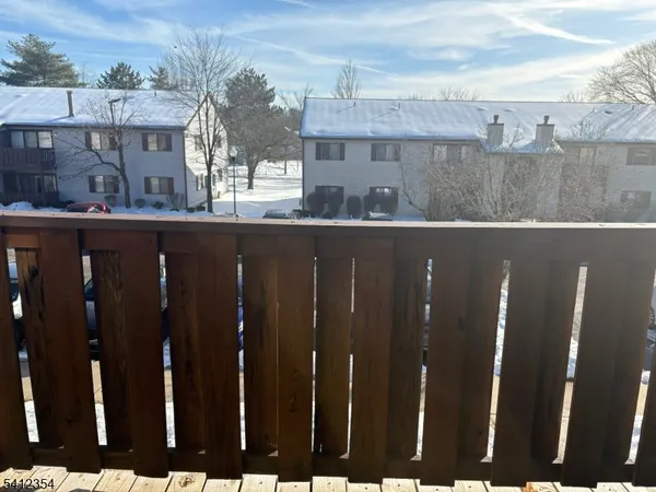 a view of a wooden fence