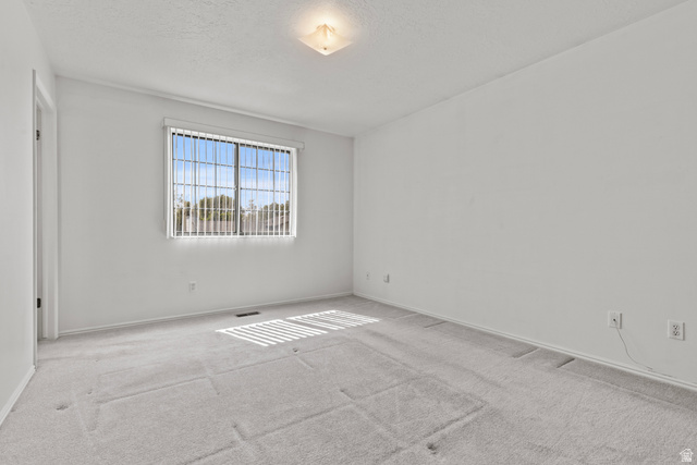 5643 South 2950th Street West Roy, UT 84067 - Photo 6 of 12 Upstairs bedroom