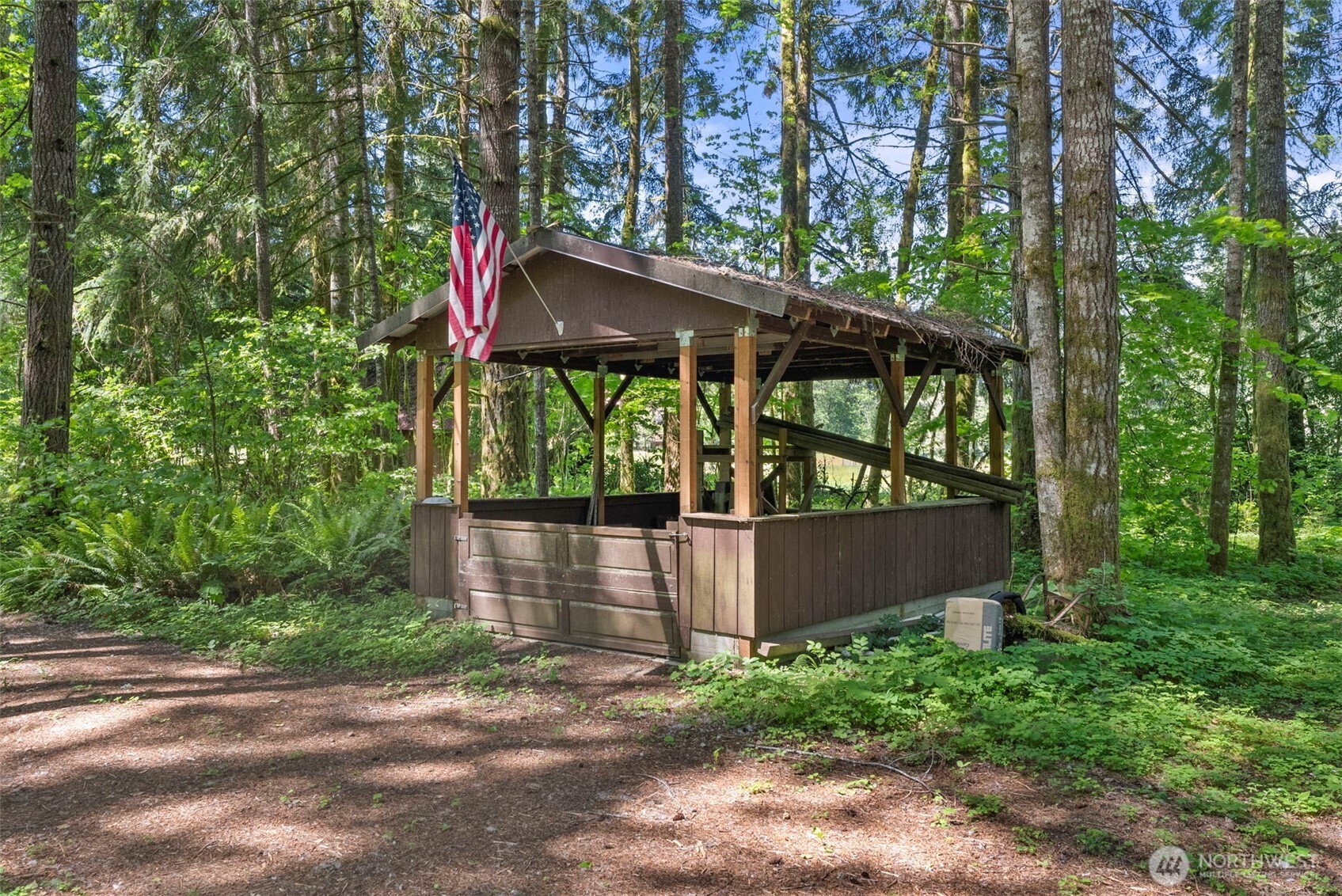 155 Bonell Road Randle, WA 98377 - Photo 36 of 38 front view of house with a yard and trees all around