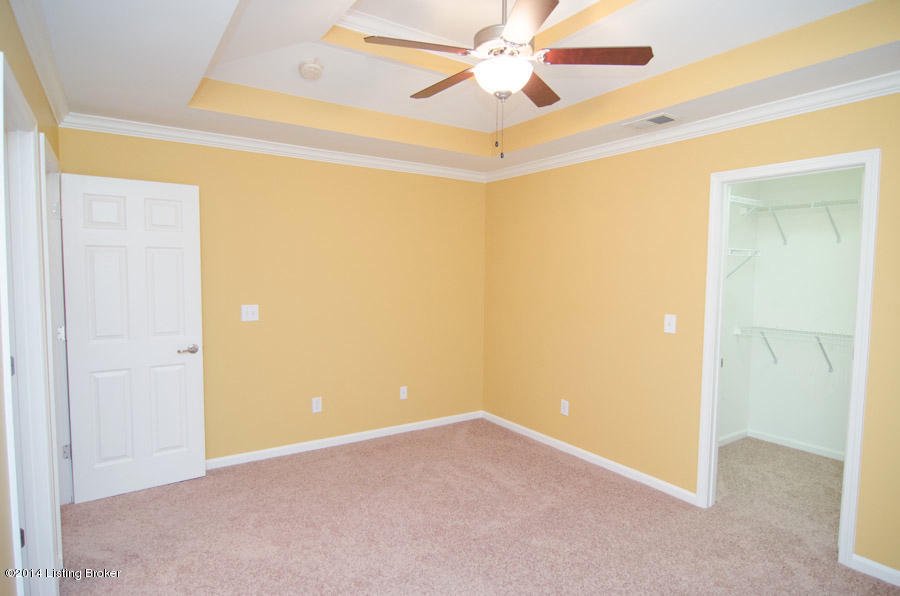 6447 Renate Road Louisville, KY 40291 - Photo 24 of 39 Master bedroom with view of the roomy walk-in closet.