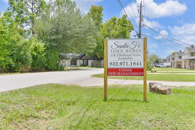a view of a street with houses