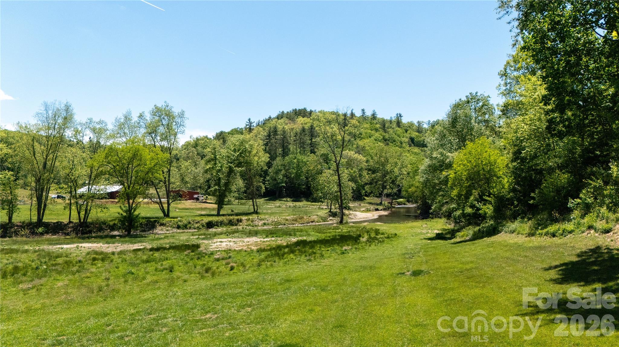 93 Franklin Crest Road Spruce Pine, NC 28777 - Photo 14 of 47 a view of a park with large trees
