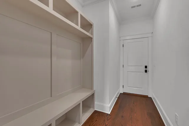 a view of room with window and hardwood floor