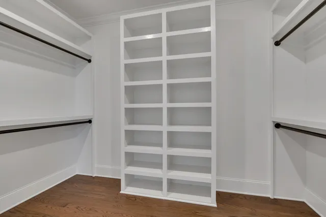 a view of an empty walk in closet