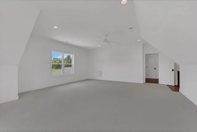 a hallway with washer and dryer