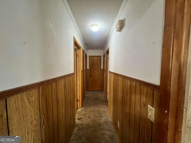 a kitchen with a sink stove and microwave