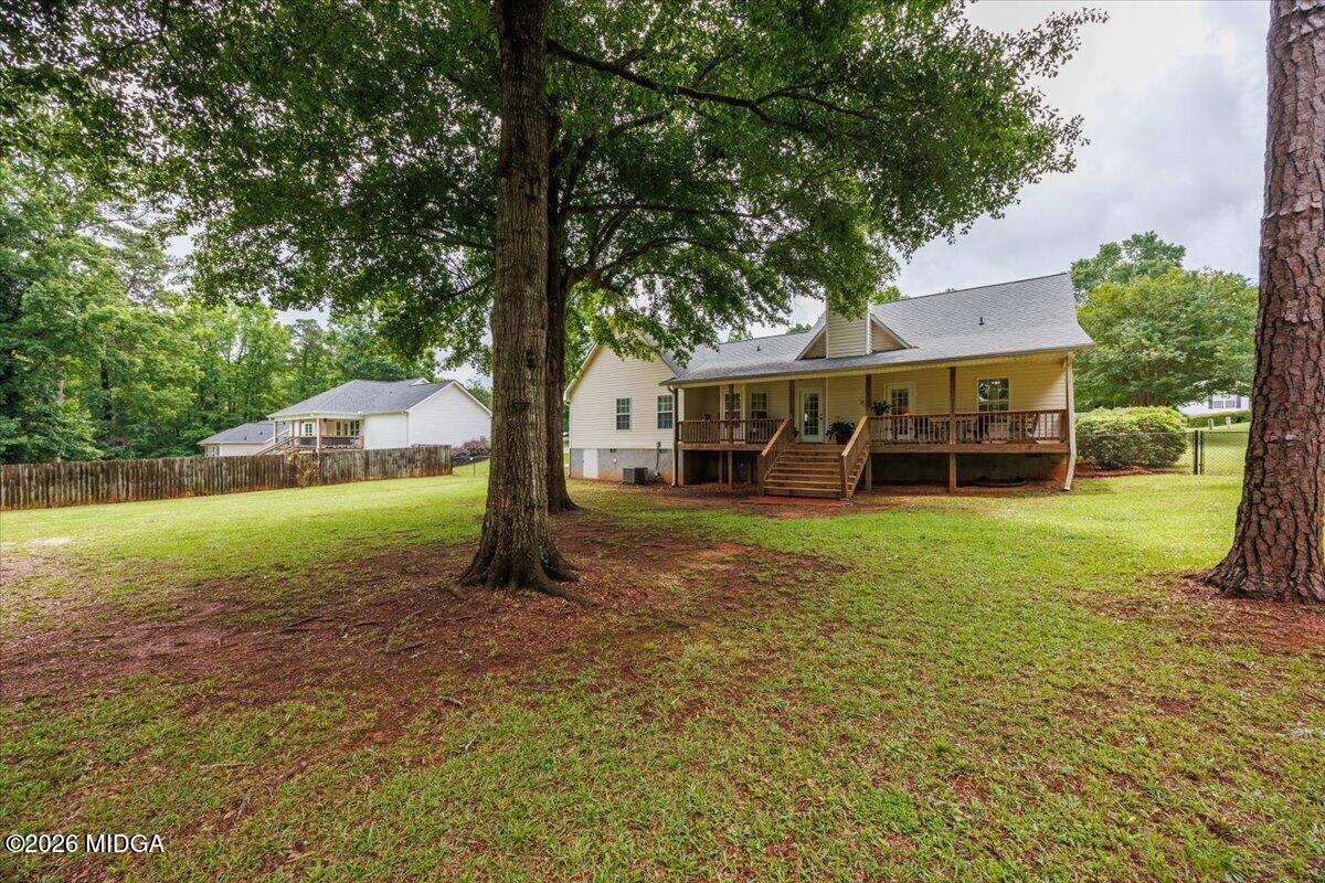 557 Aarons Circle Gray, GA 31032 - Photo 34 of 36 a view of a house with a yard