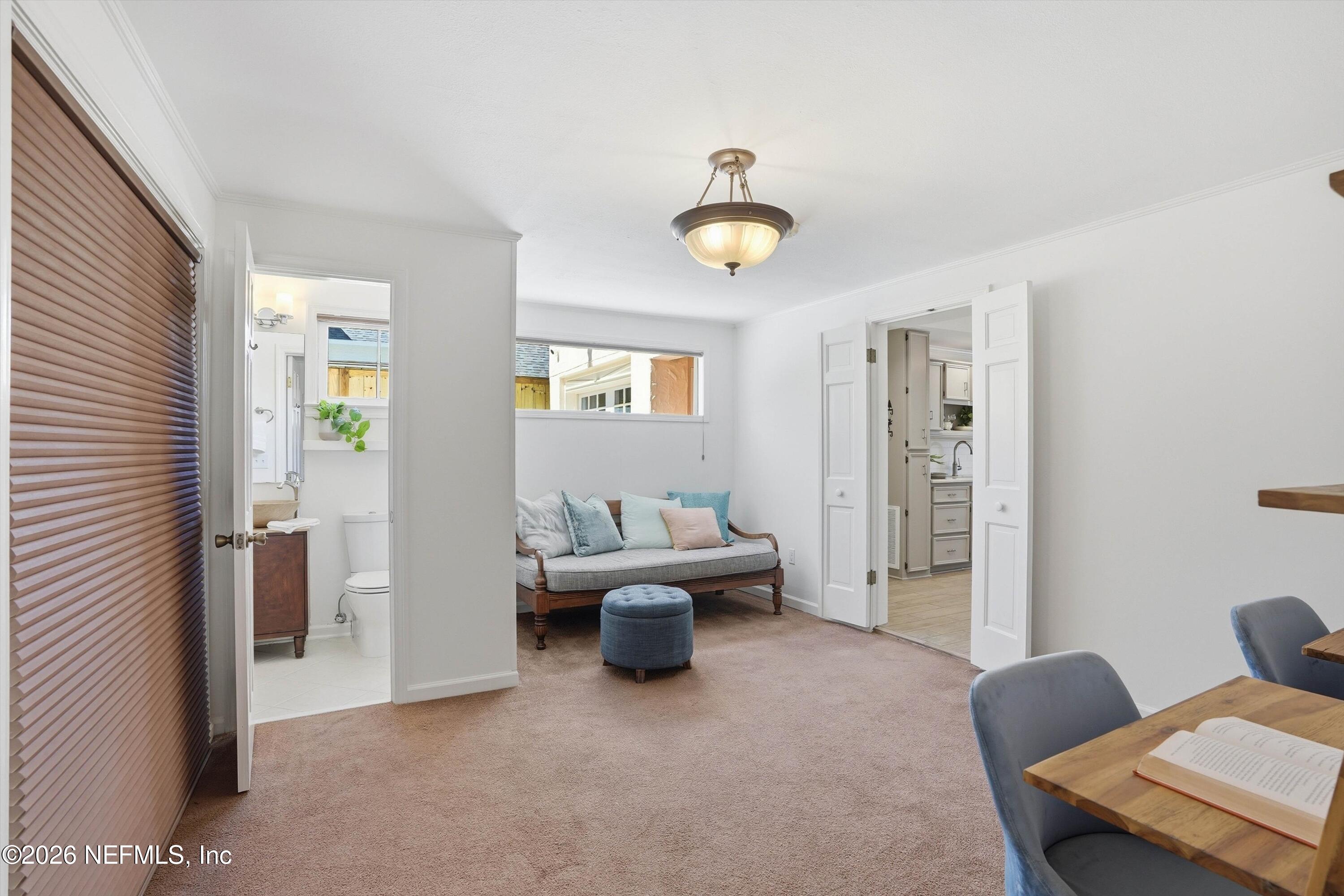 833 Sorrento Road Jacksonville, FL 32207 - Photo 36 of 68 a living room with furniture and white walls