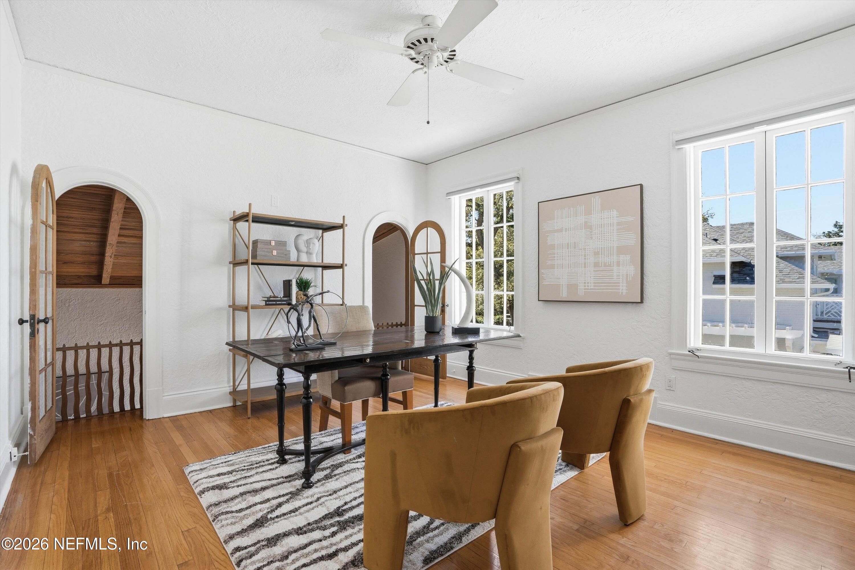 833 Sorrento Road Jacksonville, FL 32207 - Photo 37 of 68 a view of a dining room with furniture window and wooden floor