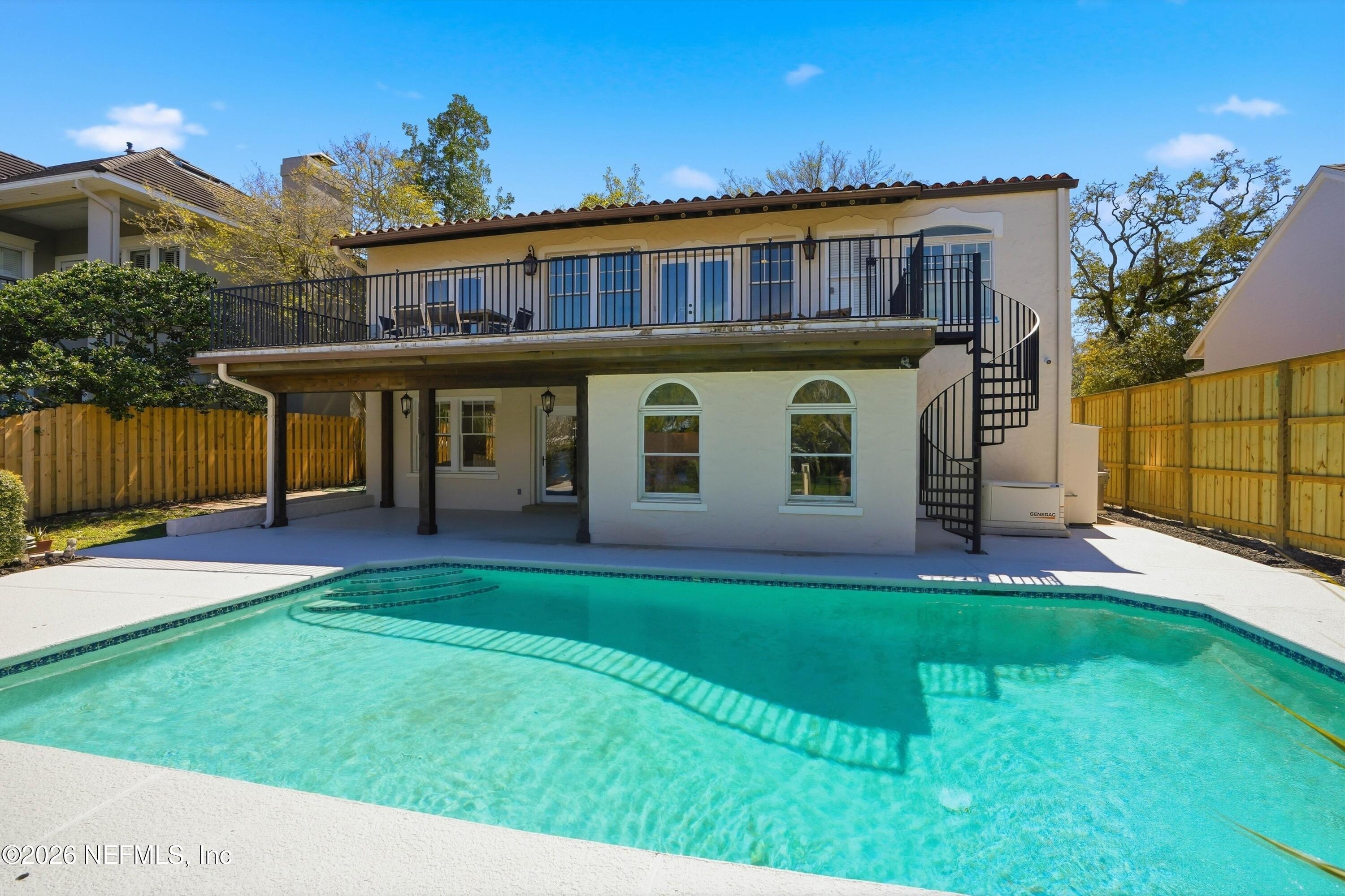 833 Sorrento Road Jacksonville, FL 32207 - Photo 47 of 68 a view of a house with a yard and sitting area