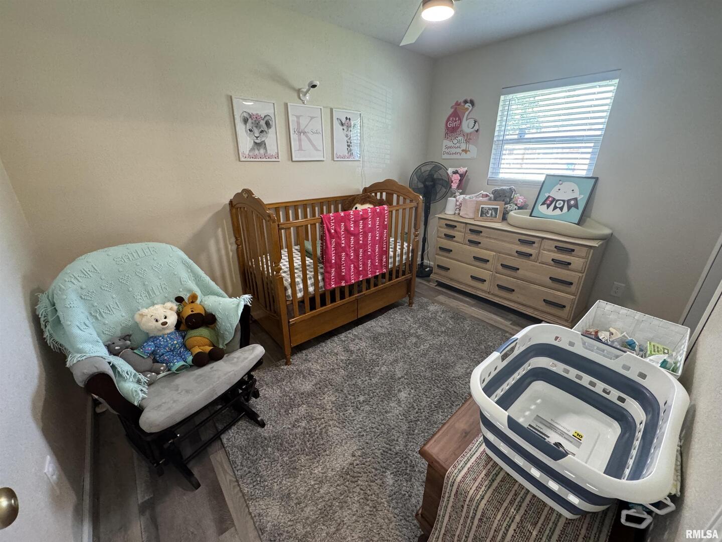 801 West 5th Street Flora, IL 62839 - Photo 18 of 48 a bedroom with a bed and a window
