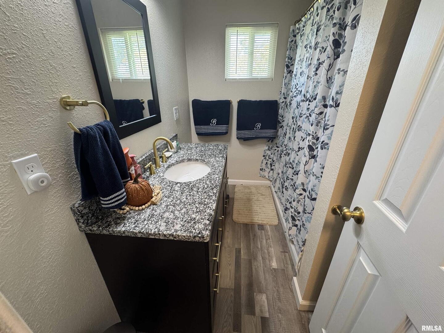 801 West 5th Street Flora, IL 62839 - Photo 28 of 48 a living room with furniture and a fireplace