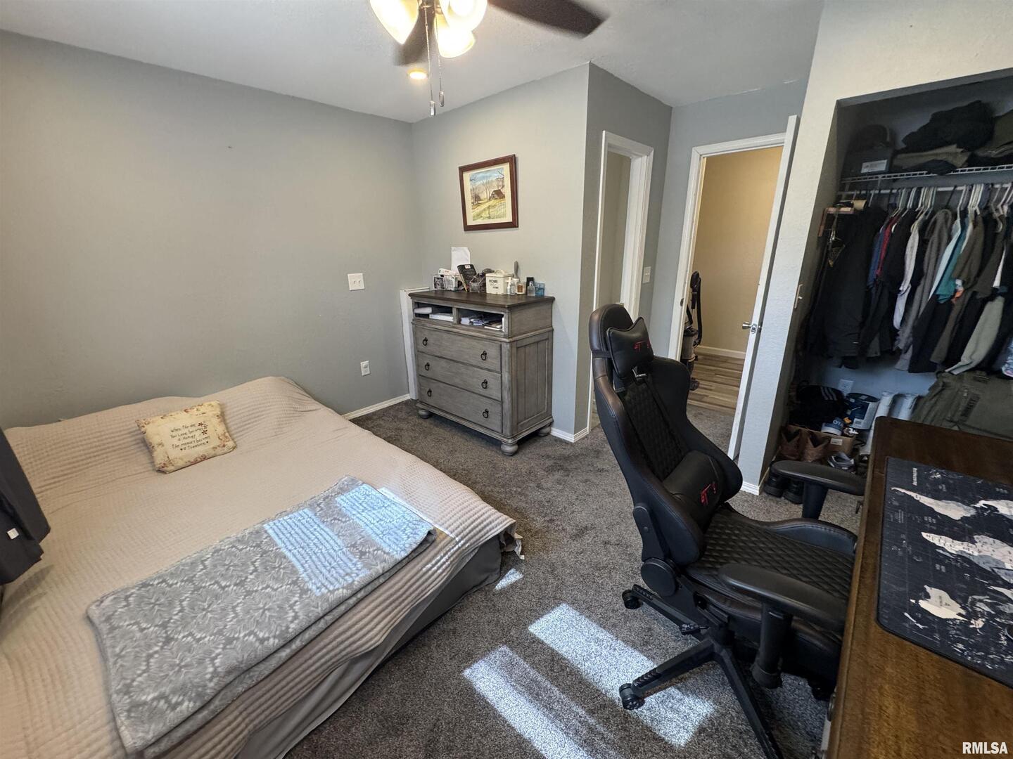 801 West 5th Street Flora, IL 62839 - Photo 32 of 48 a bedroom with furniture and a window