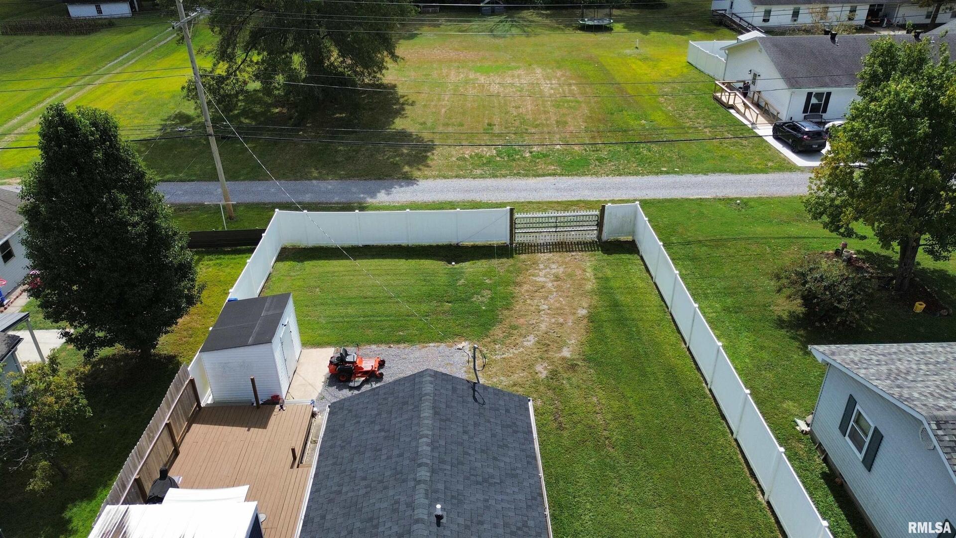 801 West 5th Street Flora, IL 62839 - Photo 46 of 48 swimming pool view with a garden