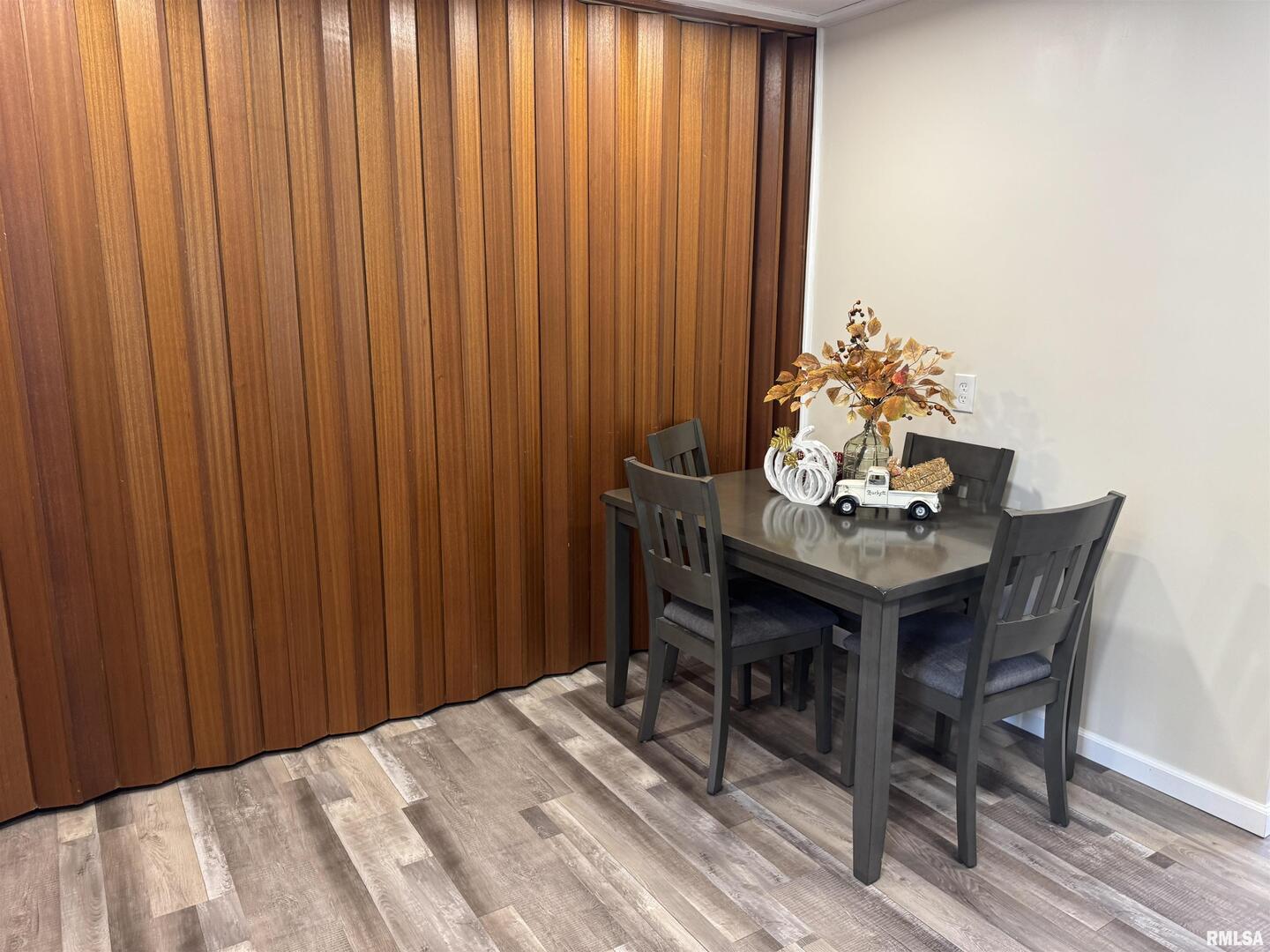 801 West 5th Street Flora, IL 62839 - Photo 10 of 48 a view of a dining room with furniture and window