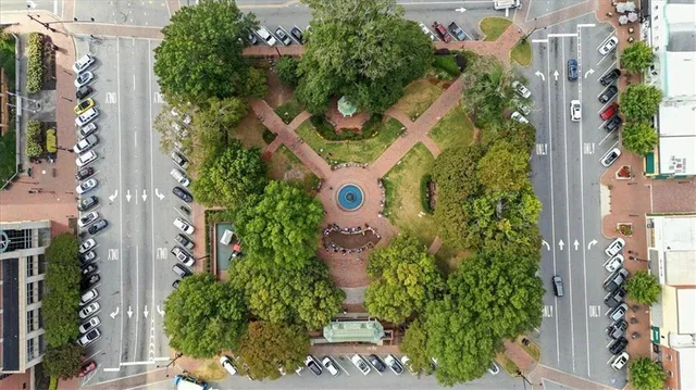 an aerial view of a house with outdoor space and street view