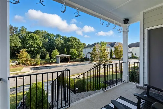 a view of a balcony with staircase