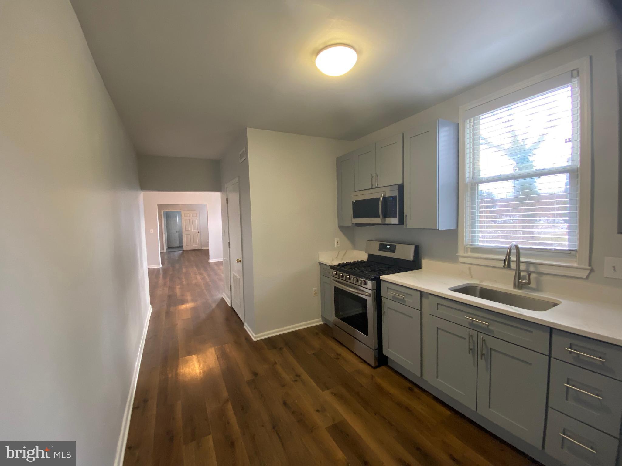 3414 Garrison Boulevard Baltimore, MD 21215 - Photo 12 of 60 Unit 1 Kitchen Cabinetry & Quartz Countertops