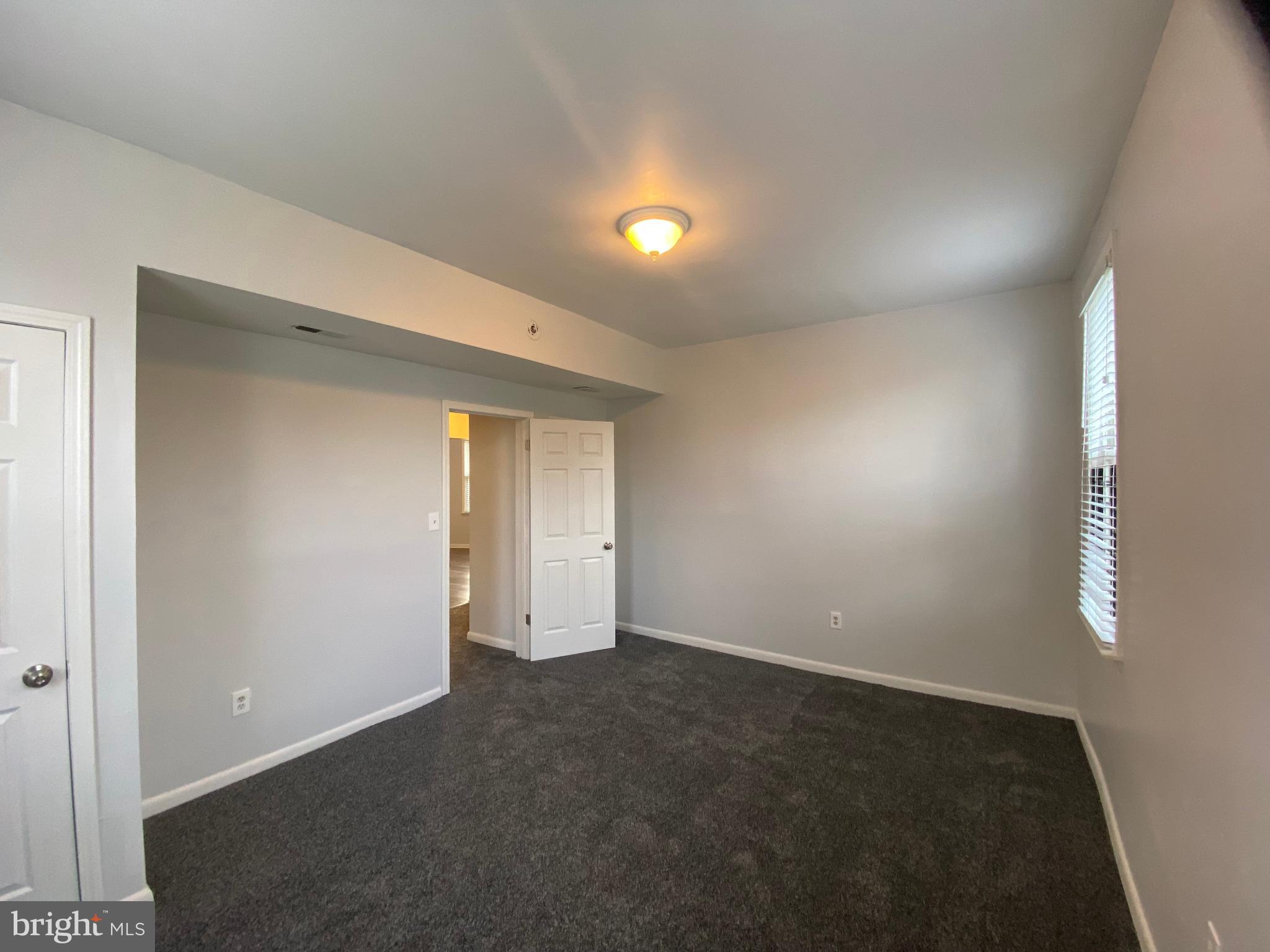 3414 Garrison Boulevard Baltimore, MD 21215 - Photo 19 of 60 Unit 1 Front Bedroom with Natural Light