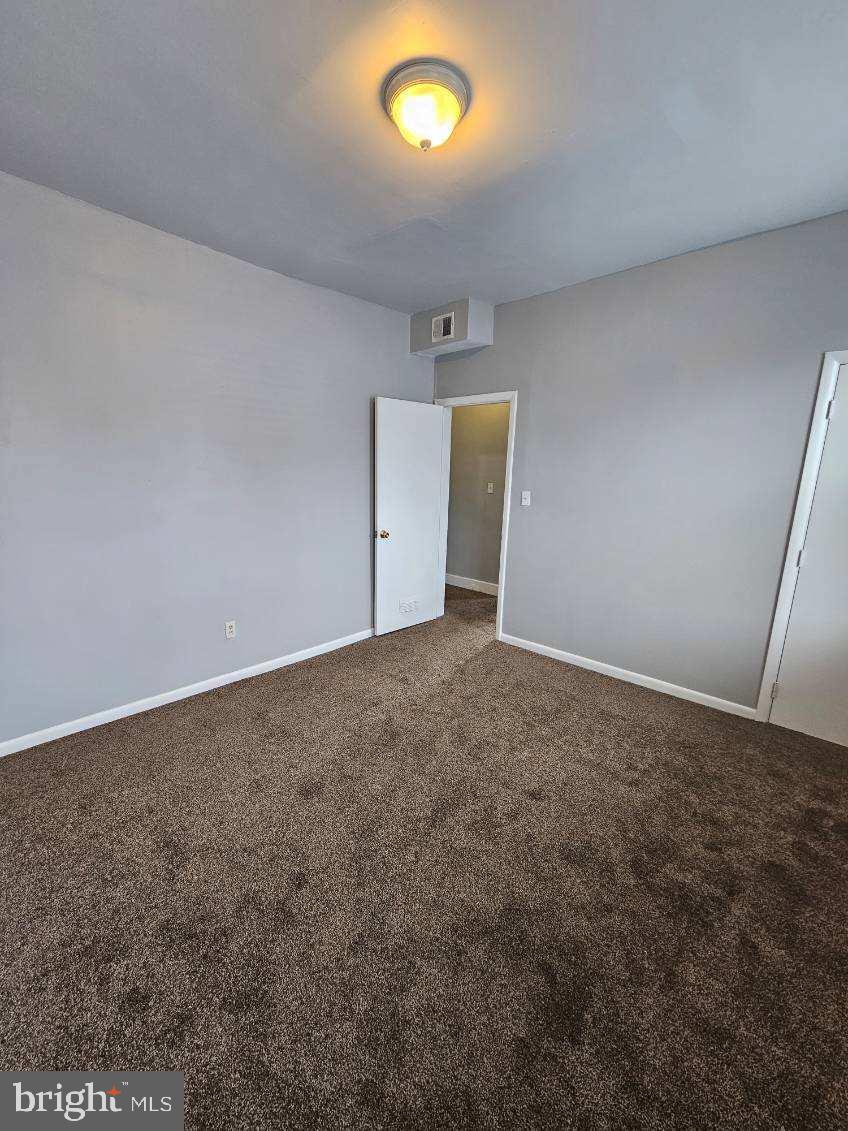 3414 Garrison Boulevard Baltimore, MD 21215 - Photo 33 of 60 Unit 2 Bedroom 2 with Carpeted Flooring