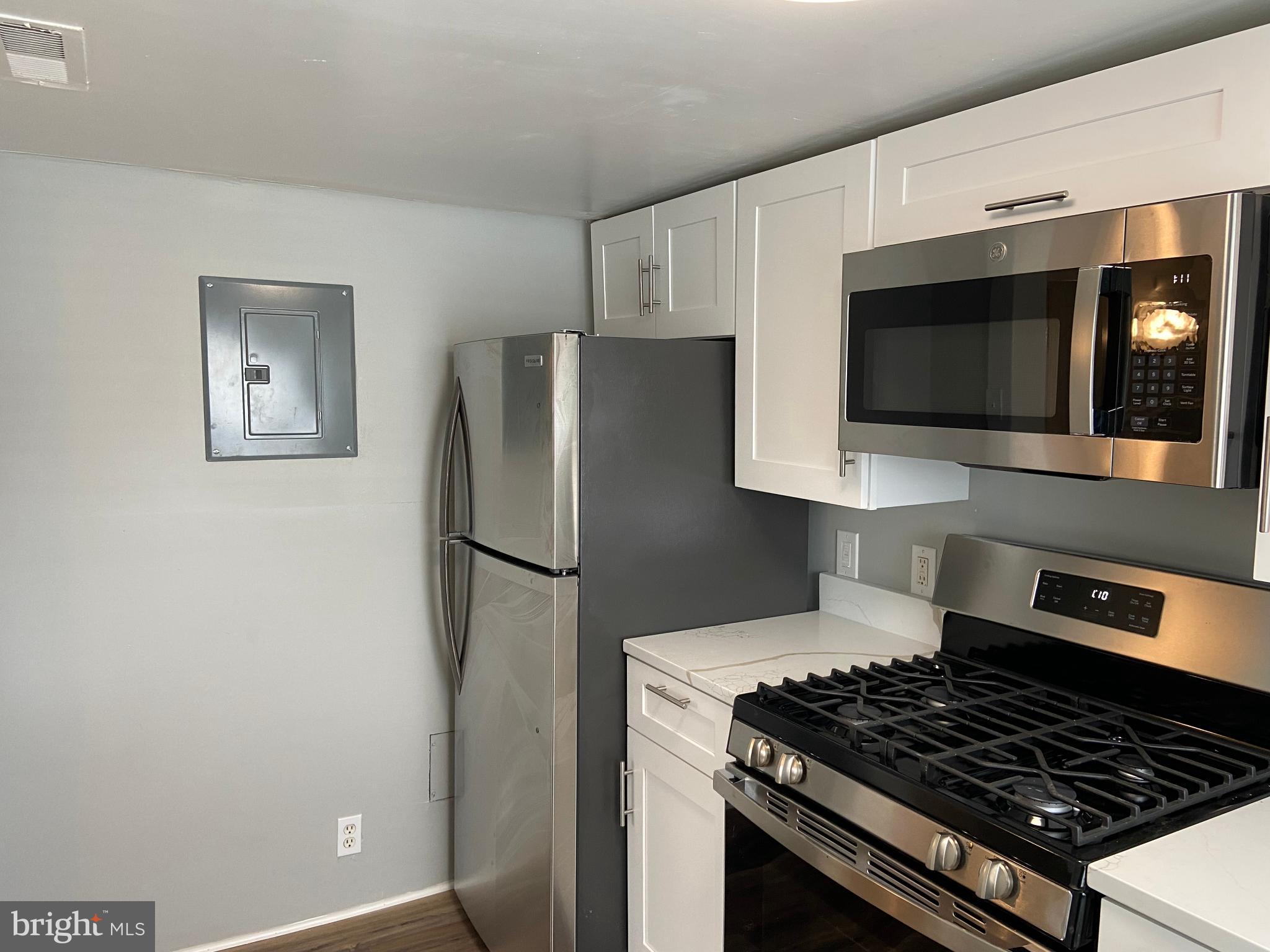3414 Garrison Boulevard Baltimore, MD 21215 - Photo 38 of 60 Unit 3 Kitchen with Stainless Appliances