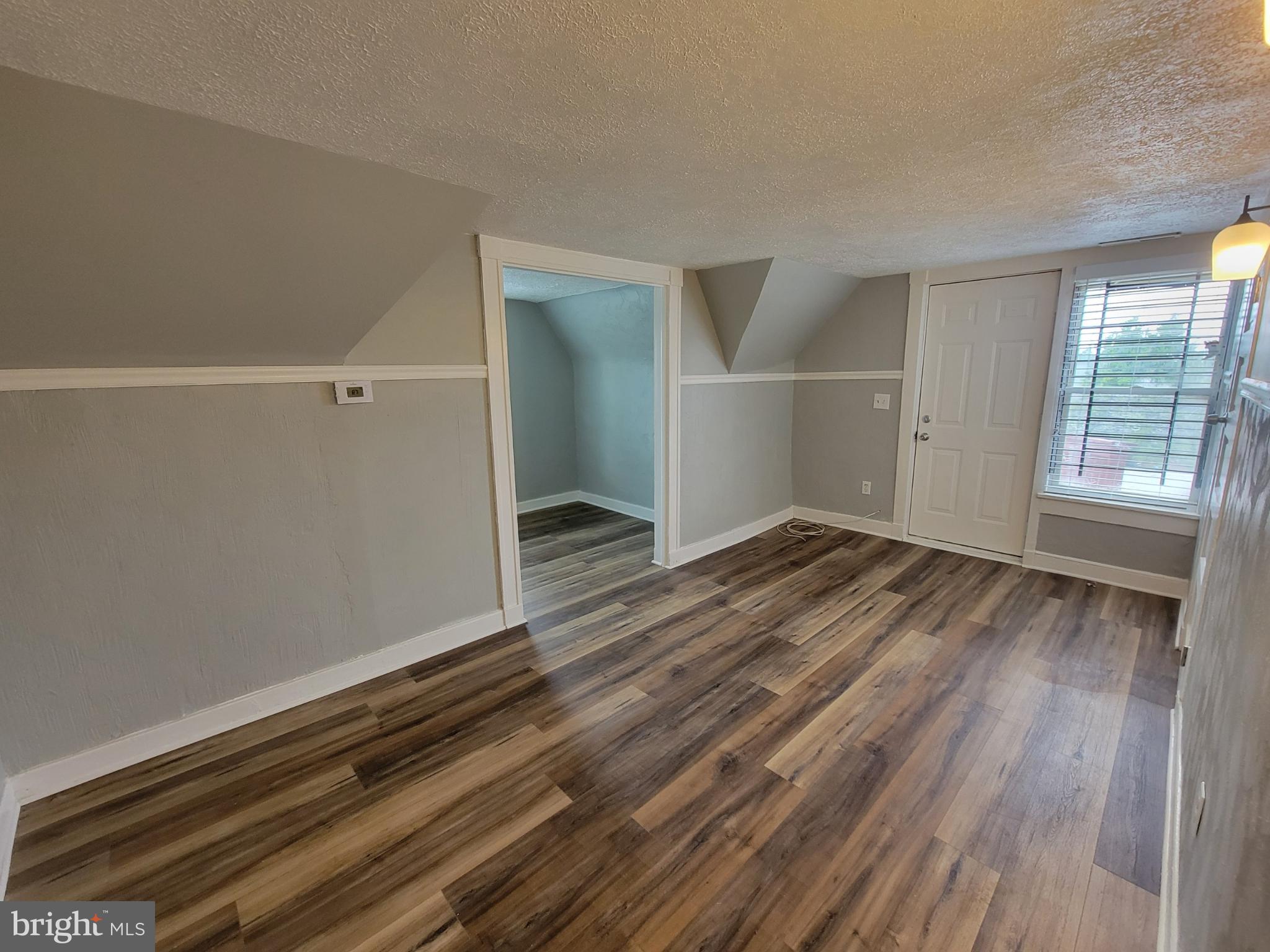 3414 Garrison Boulevard Baltimore, MD 21215 - Photo 41 of 60 Unit 3 Living Room Alternate View 2