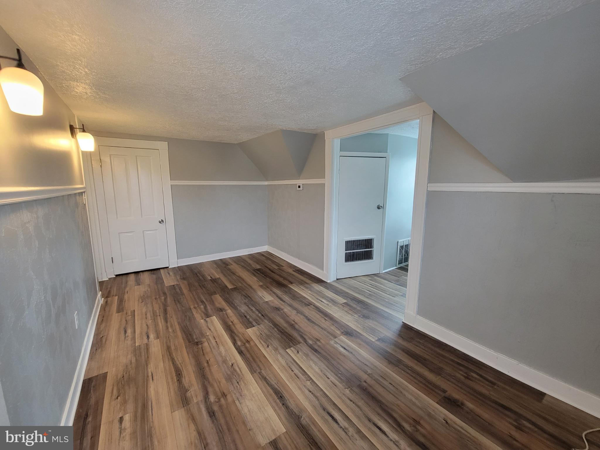 3414 Garrison Boulevard Baltimore, MD 21215 - Photo 42 of 60 Unit 3 Living Room Alternate View 3