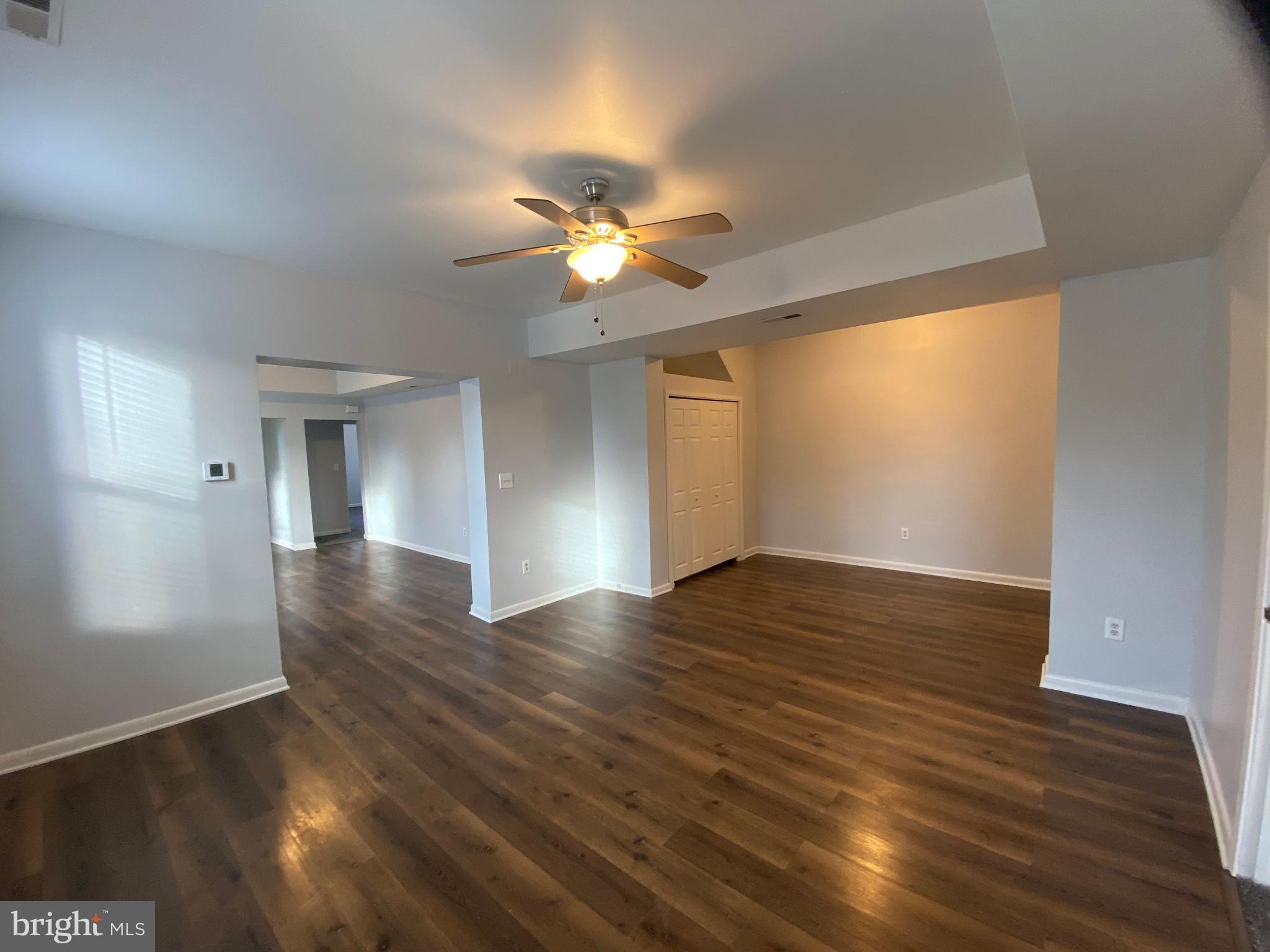 3414 Garrison Boulevard Baltimore, MD 21215 - Photo 6 of 60 Unit 1 Living Room with Luxury Vinyl Flooring