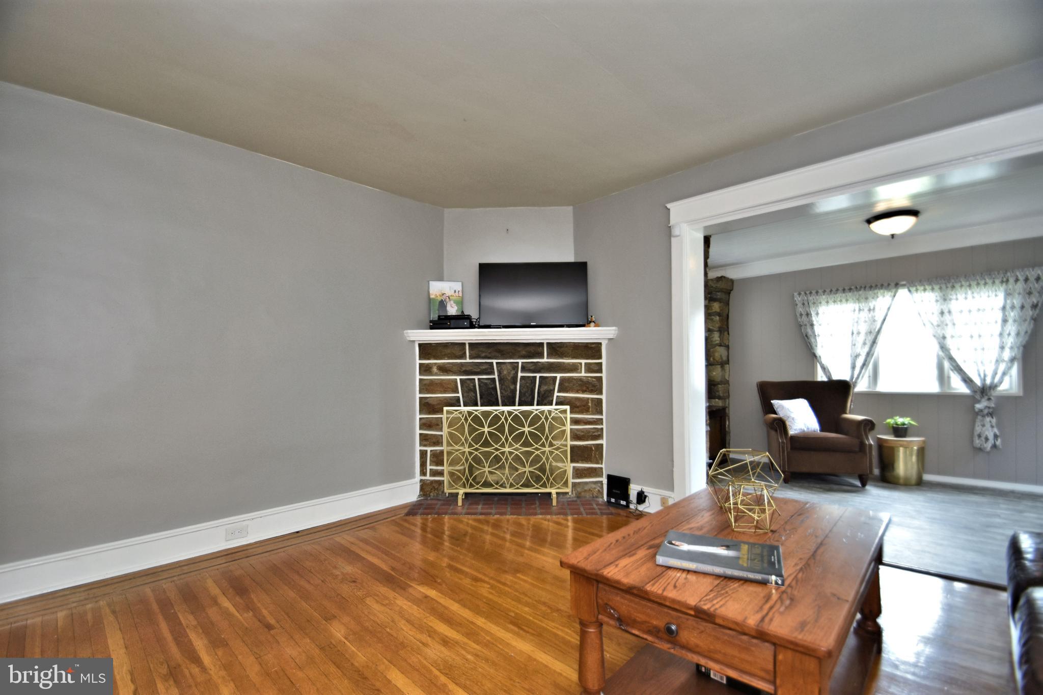 318 Ballymore Road Springfield, PA 19064 - Photo 11 of 41 Living Room w gas fireplace