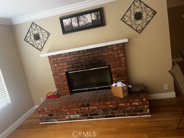 18912 Kinbrace Street Porter Ranch, CA 91326 - Photo 14 of 16 a living room with furniture and a fireplace
