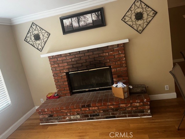18912 Kinbrace Street Porter Ranch, CA 91326 - Photo 10 of 16 a living room with furniture and a fireplace