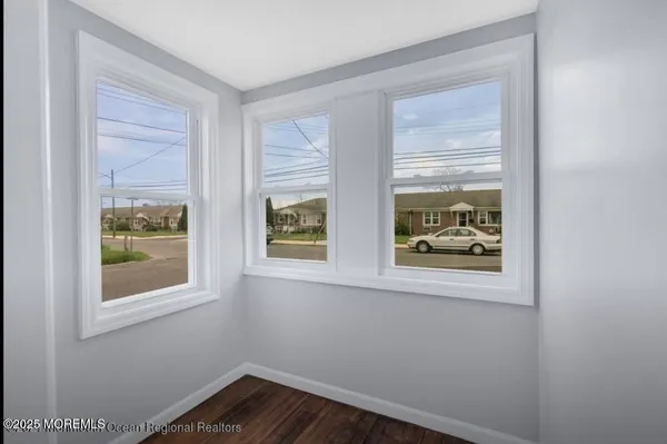 a small space with window and furniture