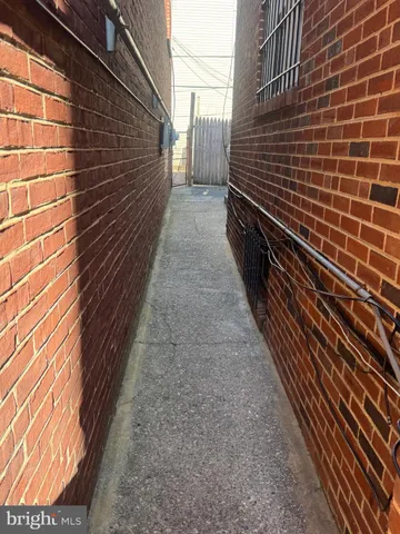 a view of a pathway both side of building