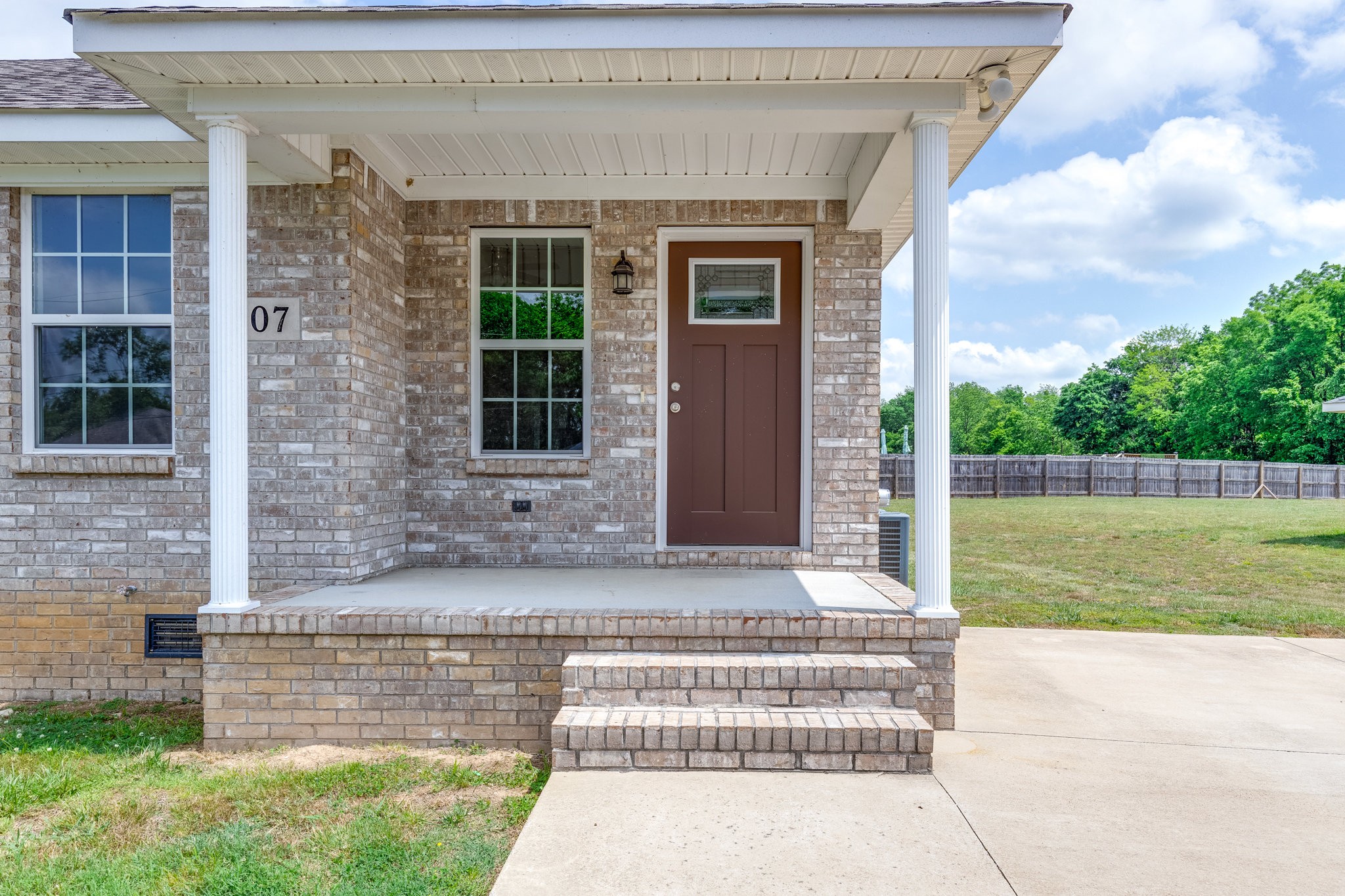 107 Ragsdale Lane Pulaski, TN 38478 - Photo 10 of 25 a front view of a house with a yard