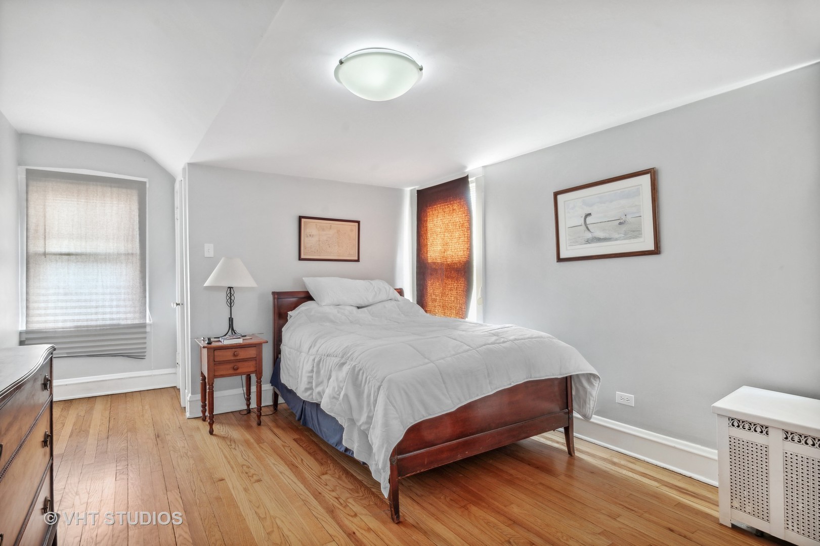 996 Chatfield Road Winnetka, IL 60093 - Photo 11 of 19 a bedroom with a bed and a potted plant on dresser