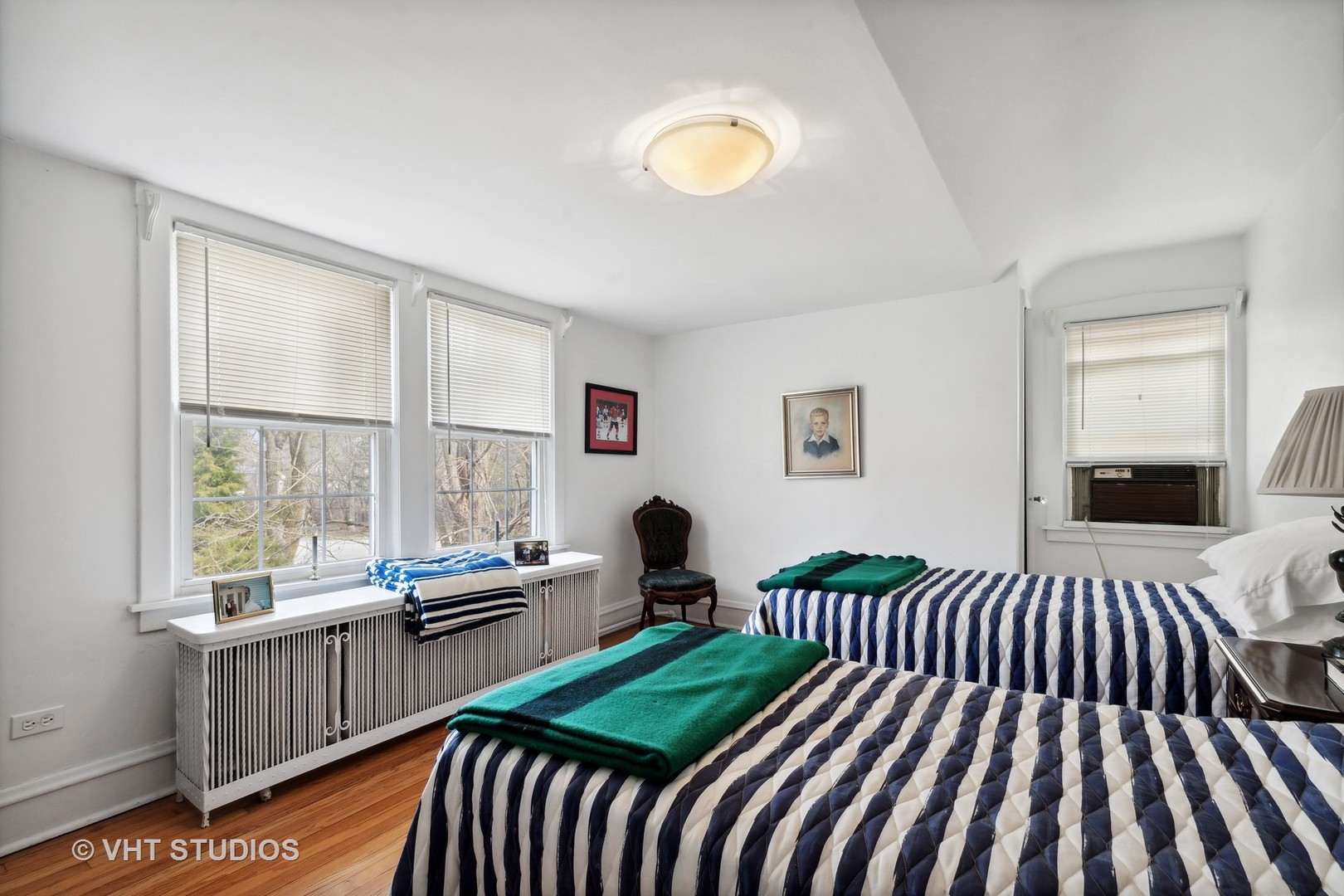 996 Chatfield Road Winnetka, IL 60093 - Photo 10 of 19 a bedroom with furniture and a window