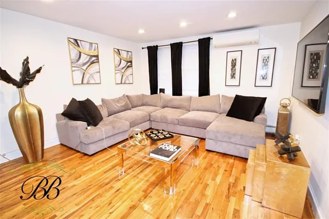 a living room with furniture and a couch