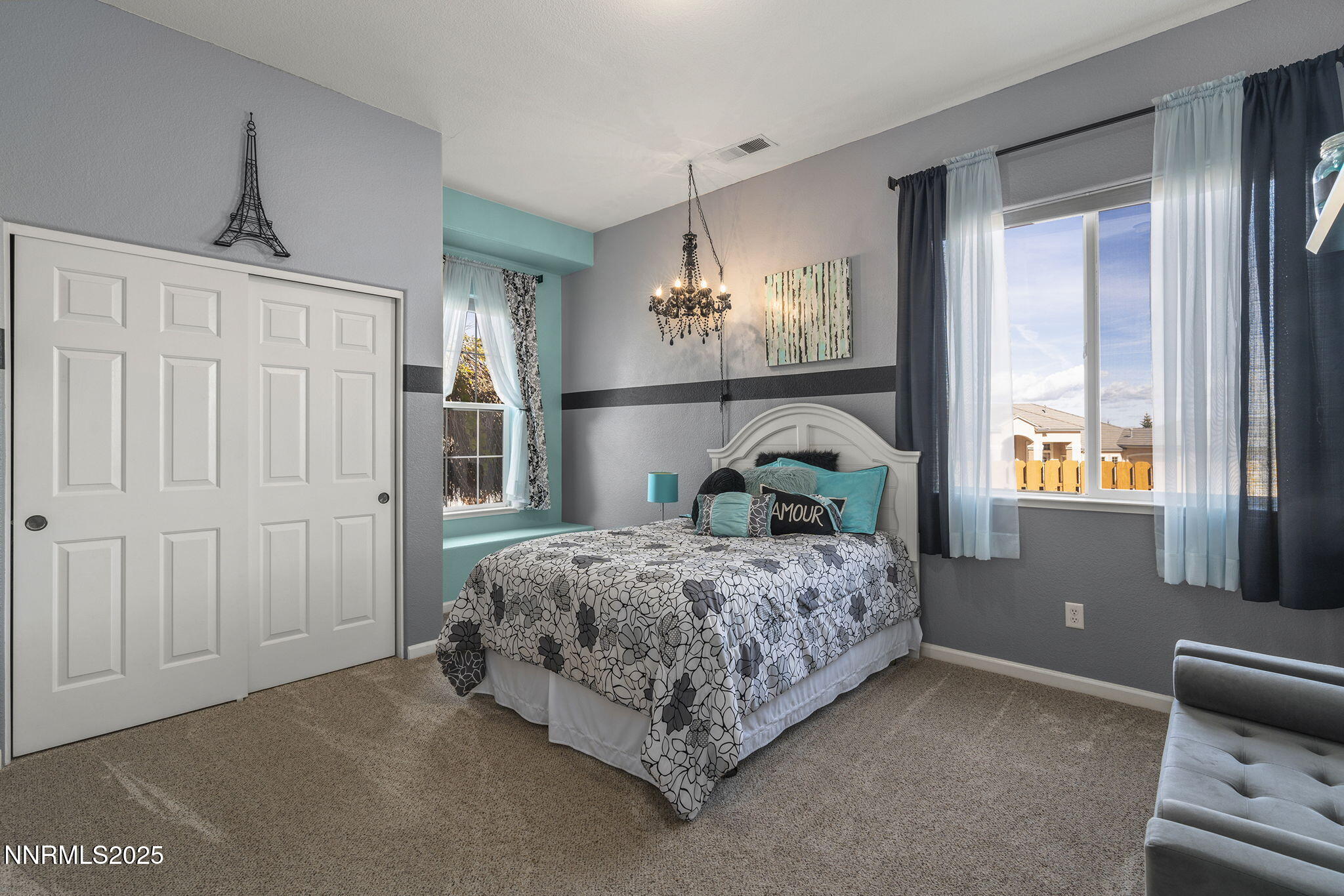 5502 New Mexico Court Reno, NV 89511 - Photo 23 of 55 a bedroom with a bed and window
