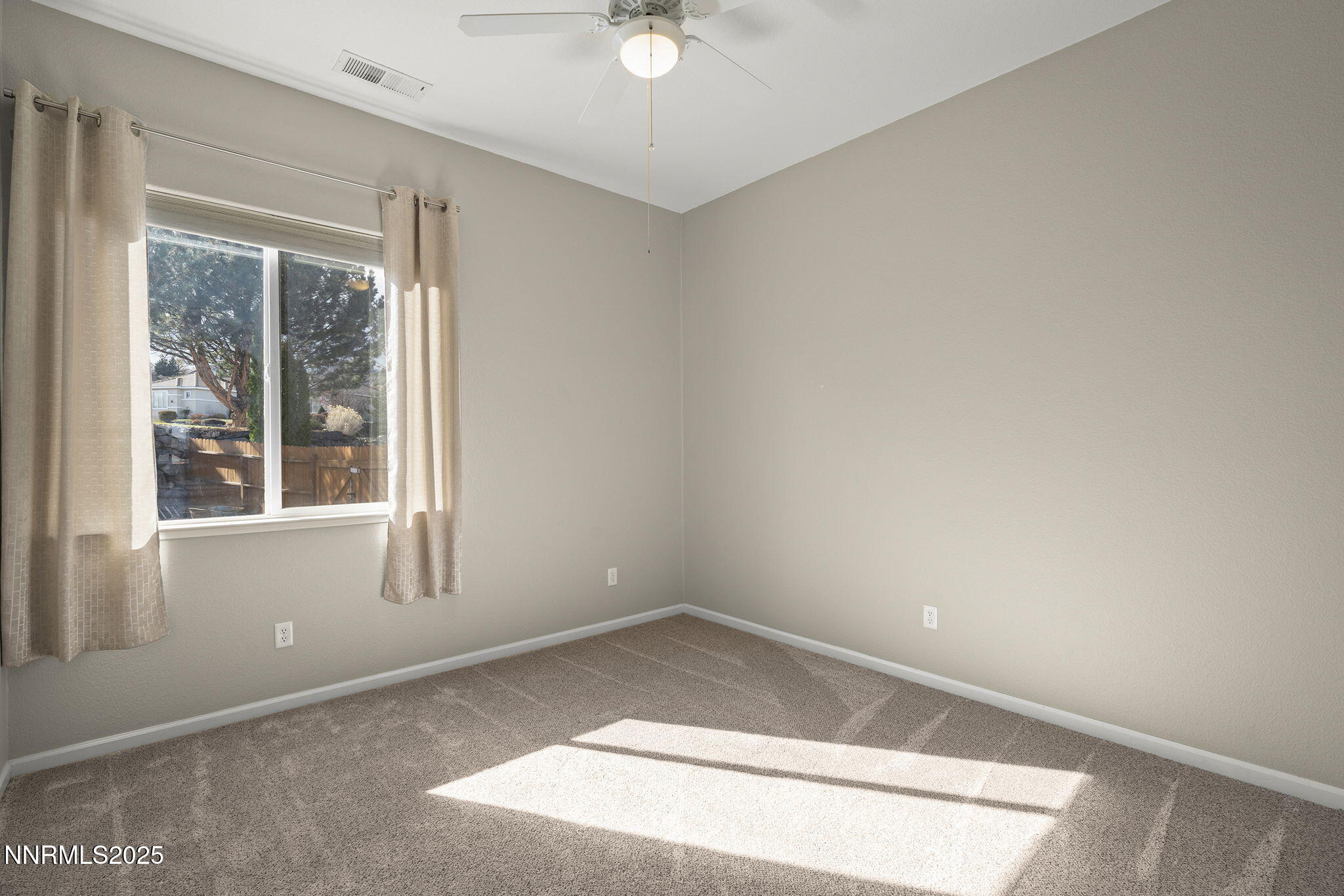 5502 New Mexico Court Reno, NV 89511 - Photo 27 of 55 an empty room with a window